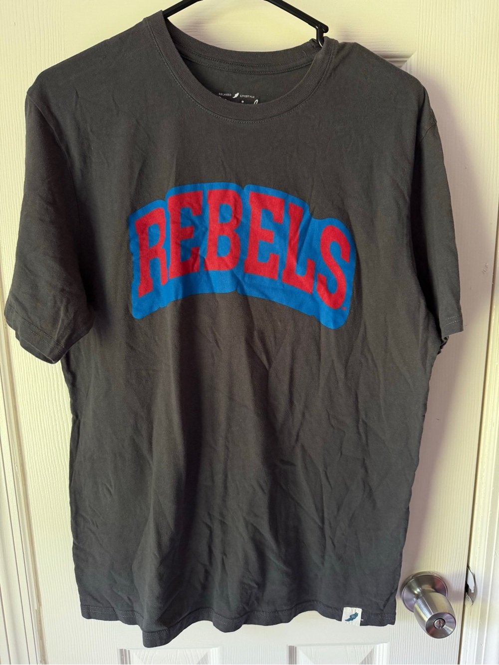 League Unwind Graphic Tee in Black with Red & Blue Accent